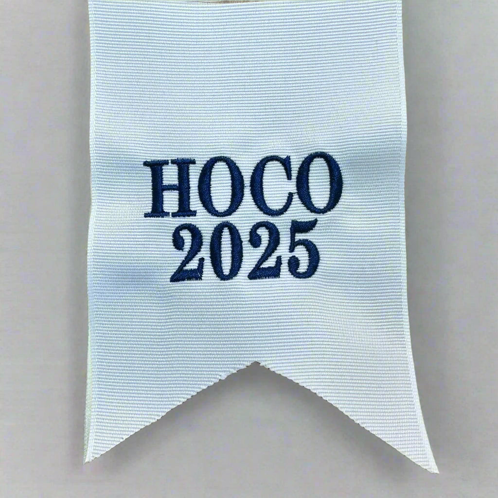 Monogrammed white grosgrain ribbon for a homecoming bouquet