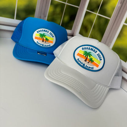Turquoise blue and white trucker hats with oval palm tree Bahamas 2024 patch